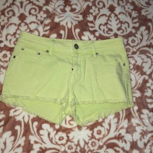Neon green denim shorts